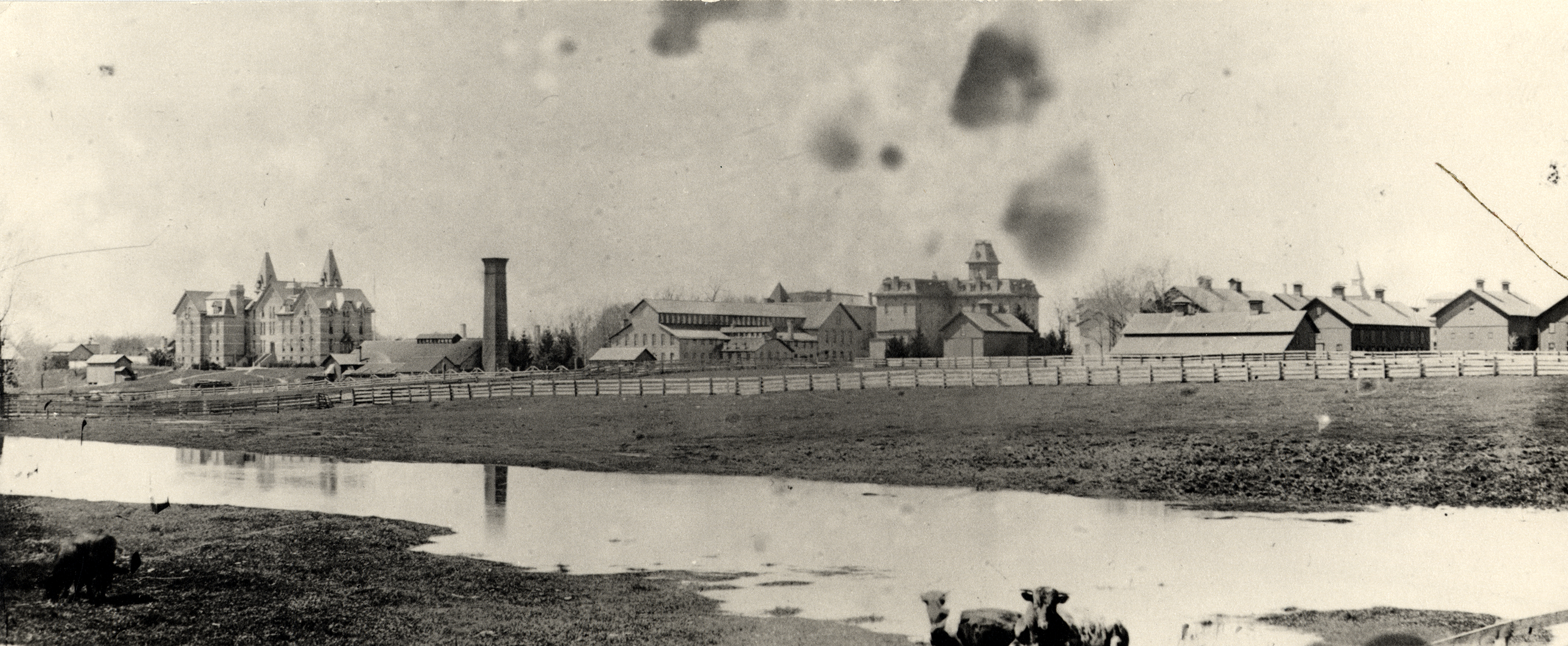 vintage photo of the red cedar river as an industrial riverfront