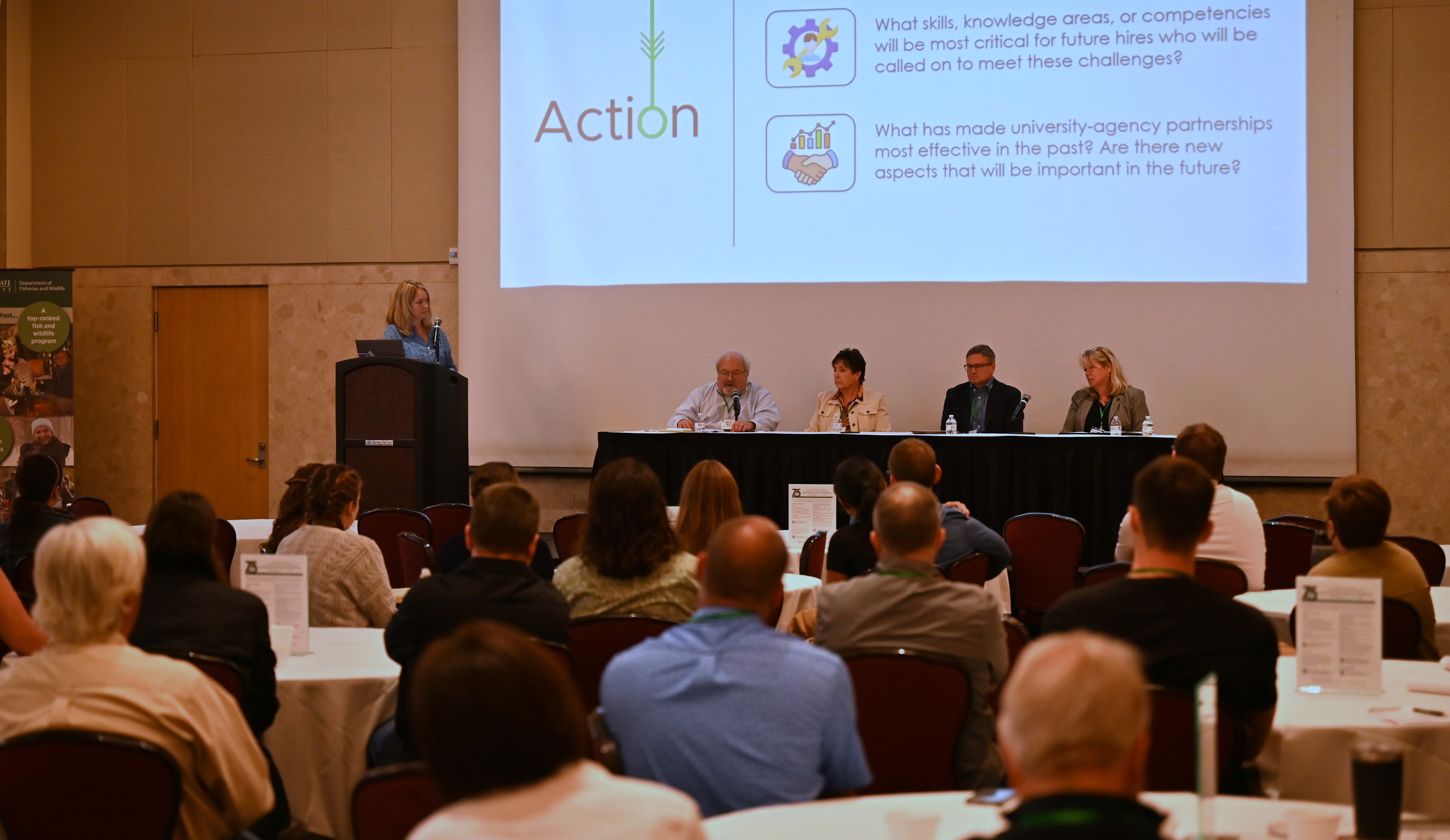 Panelists discuss the future of university–agency partnerships before a packed audience at the 75th Anniversary Symposium. 