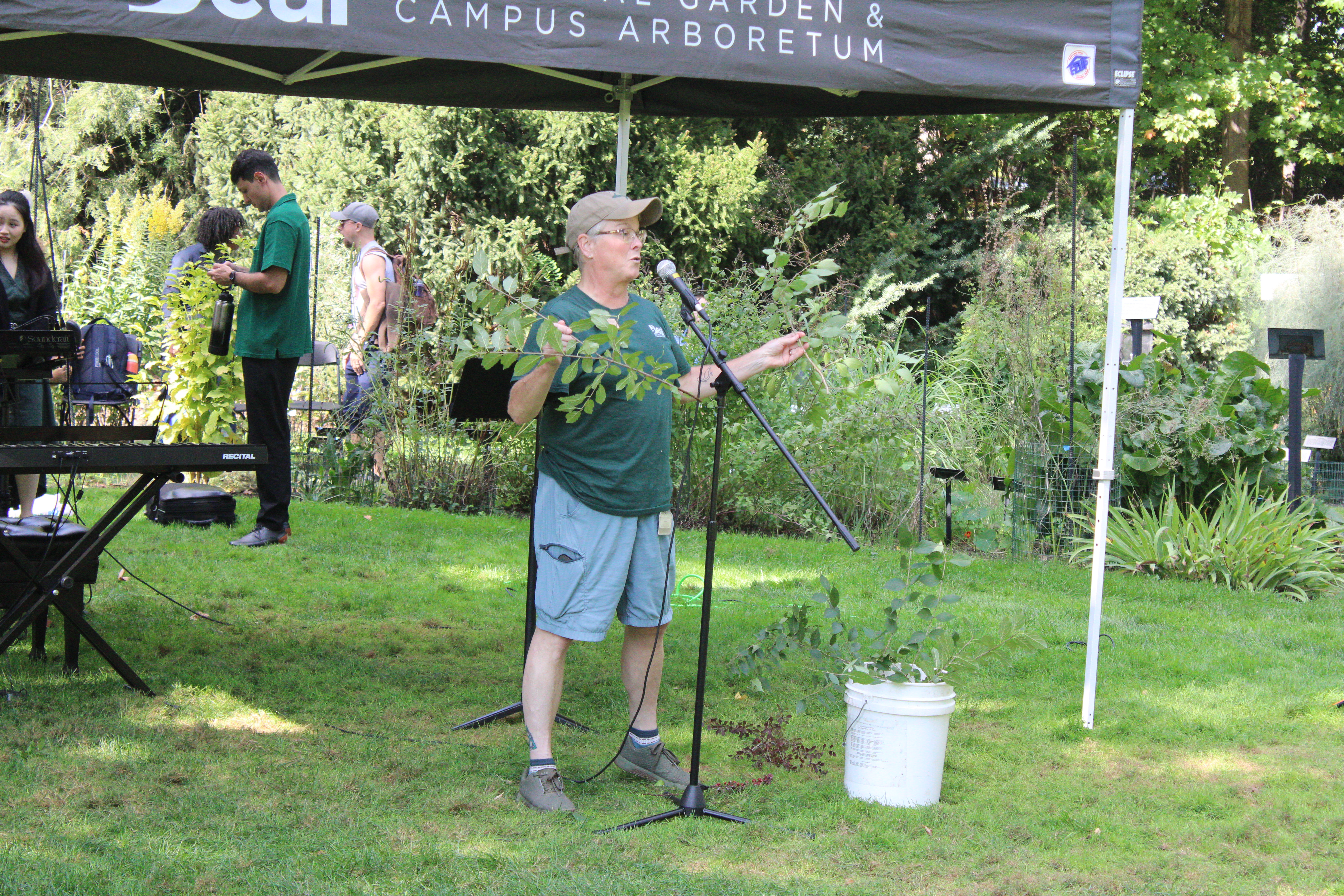Person presents on invasive plants.
