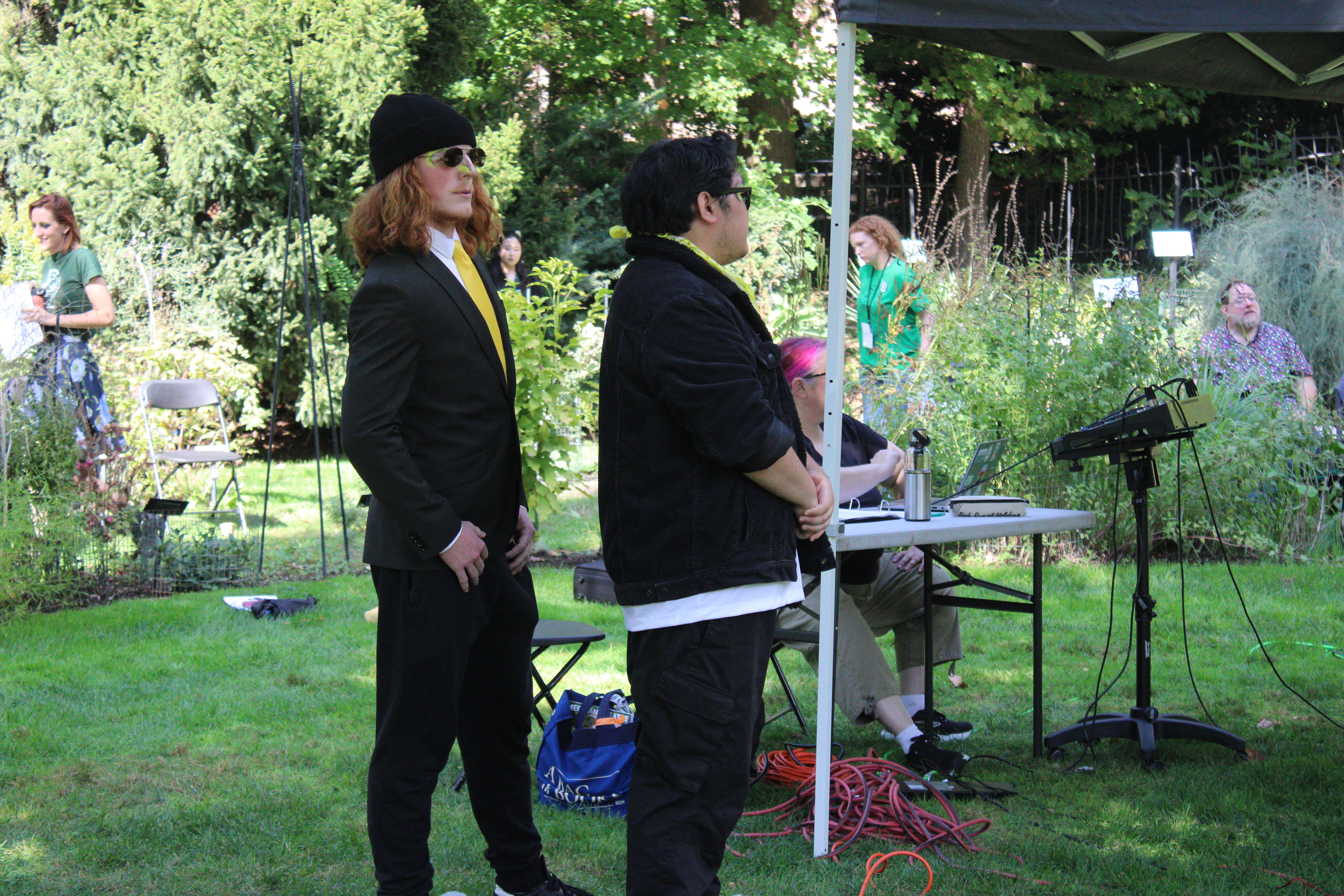 Performers prepare for the satirical penguin piece.