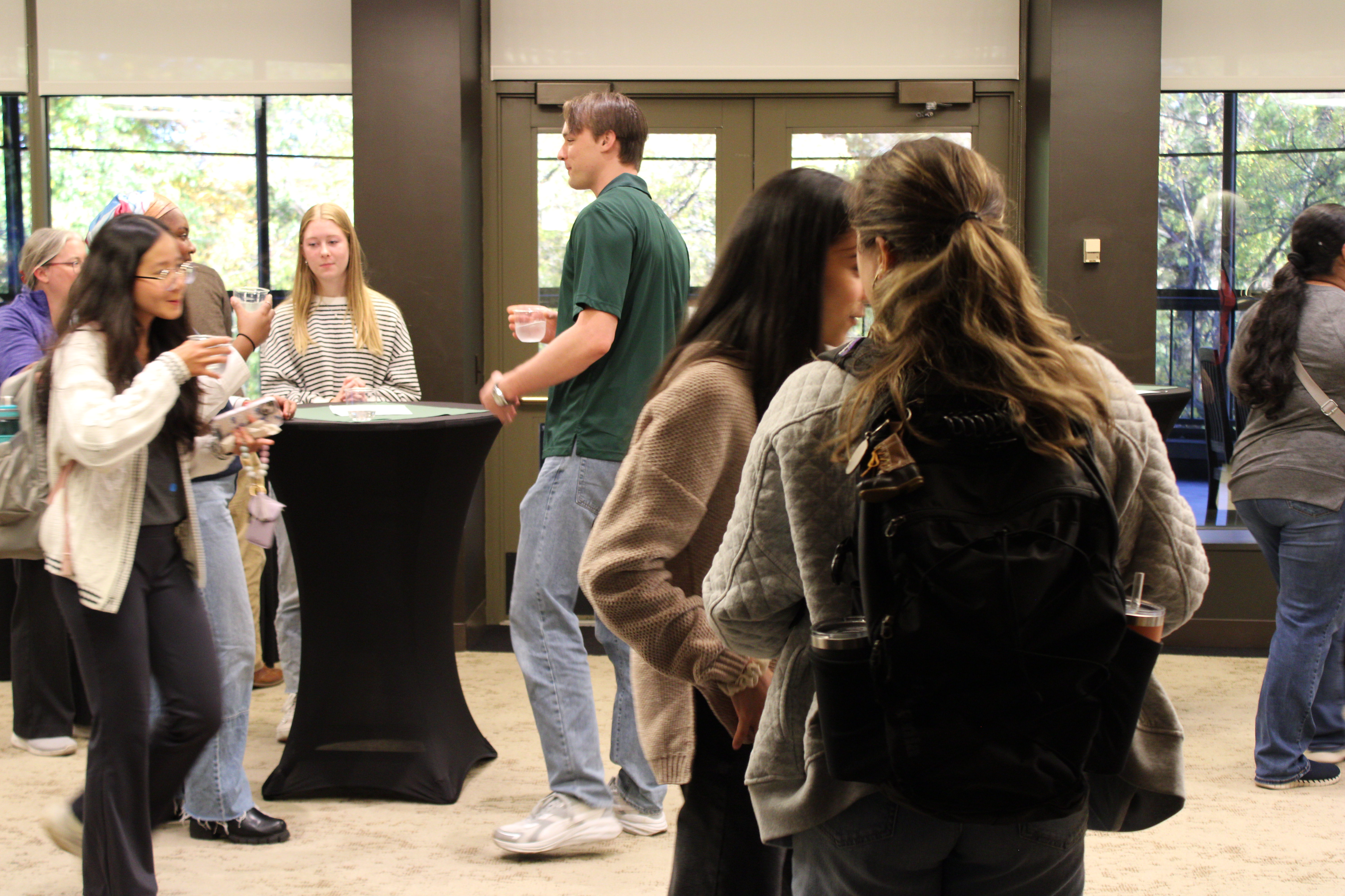 Student networking at ECP event.