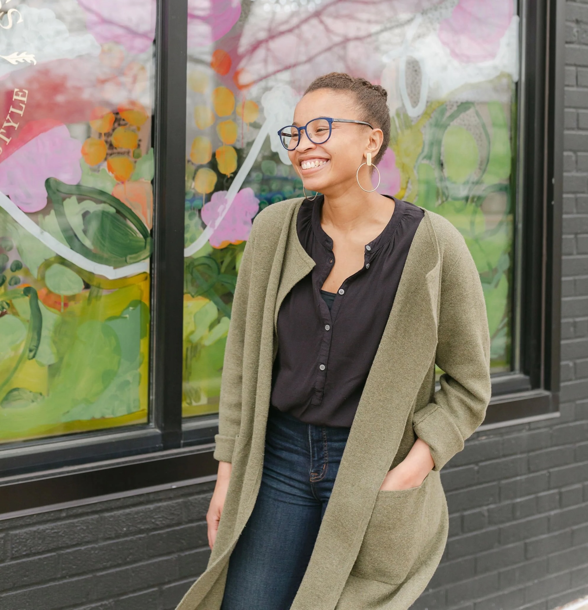 Avery Williamson close-up outside of Thistle & Bess.