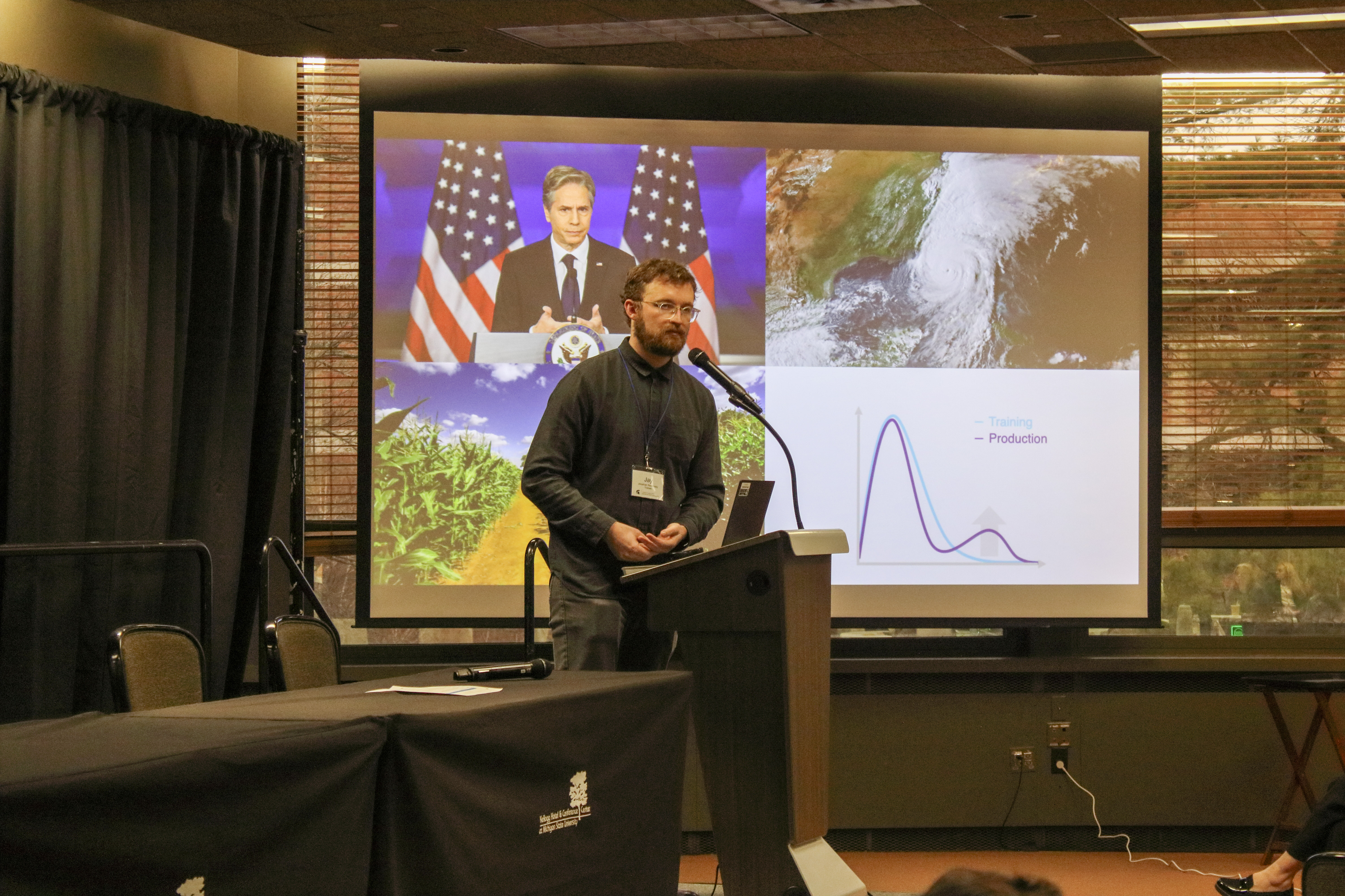 Jay Revolinsky presents research during the symposium.