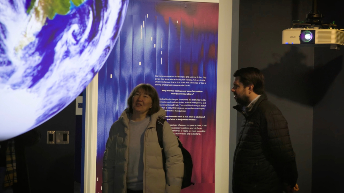 Elena Litchman and Ethan Theuerkauf at the MSU Museum.
