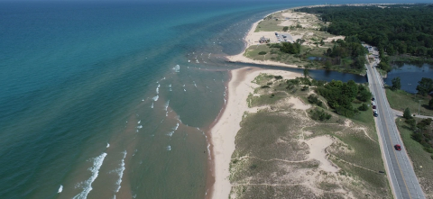 drone view of lake coastline in Ludington, Michigan