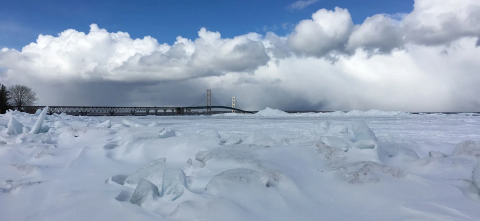 straights of Mackinaw view of lake ice with bridge in background