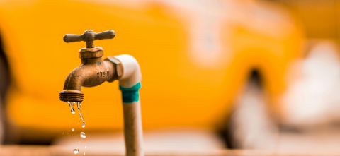 Water flowing from a pipe.